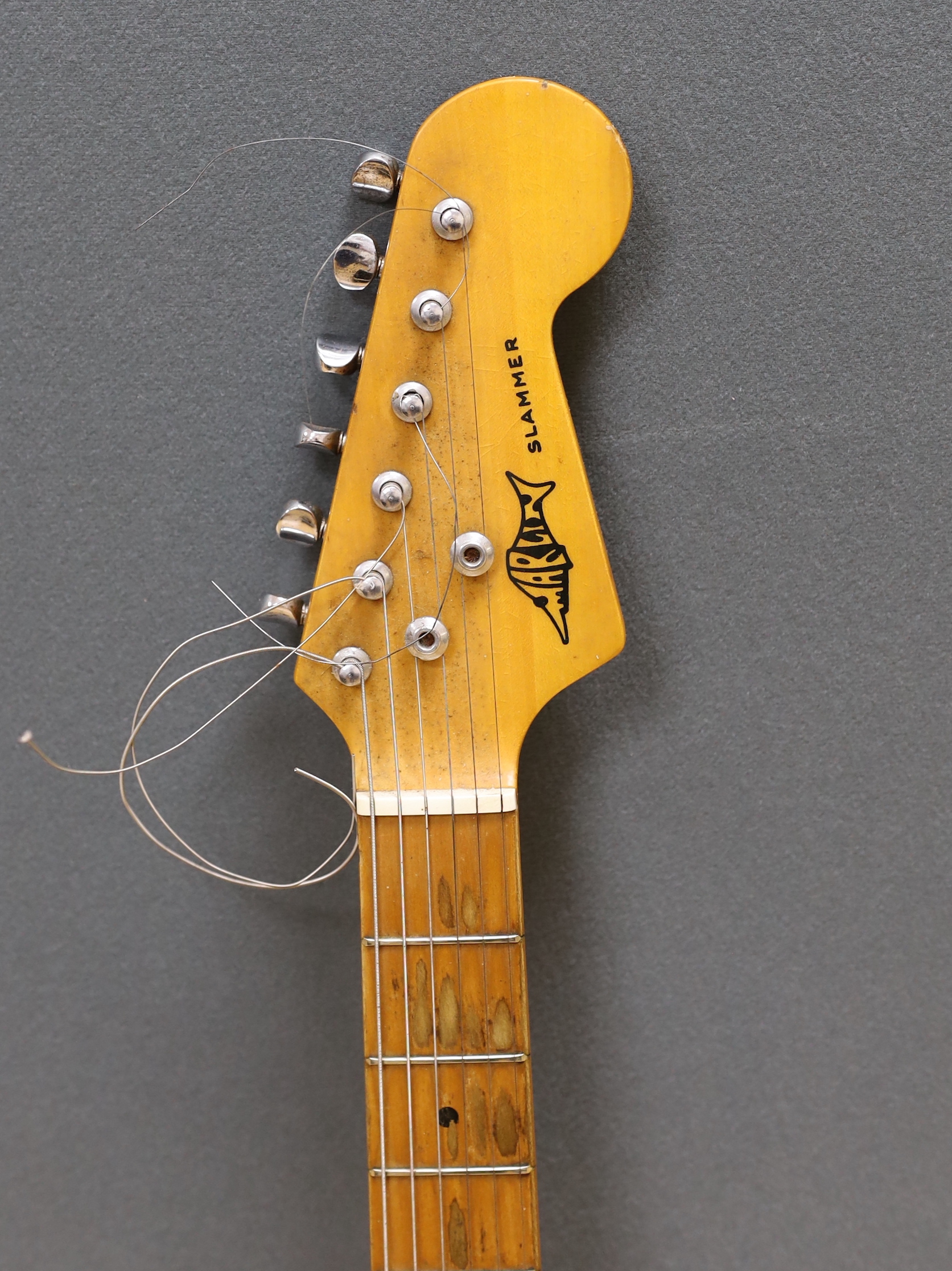 A Marlin Slammer electric guitar with maple neck, together with a flight case